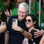 Apple fans touch CEO Tim Cook's feet at Delhi store