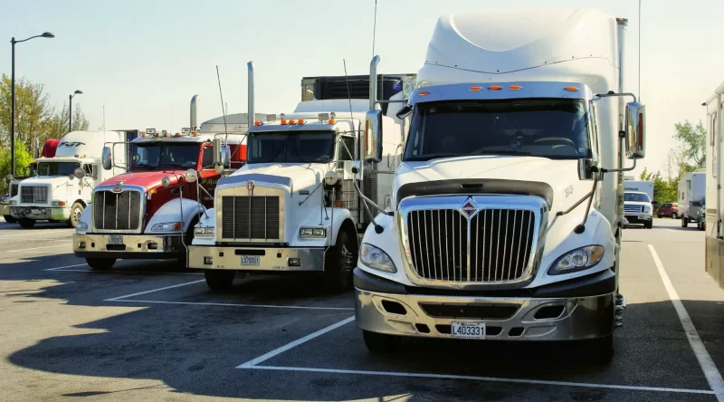 How To Invest in Trucking Without Driving